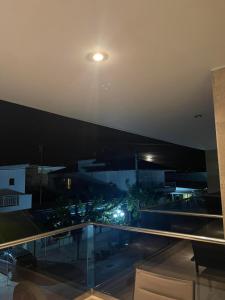 a view from the roof of a building at night at Centrum Rooms in Kallithea Halkidikis