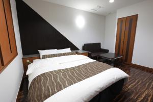 Postel nebo postele na pokoji v ubytování HOTEL C-PLUS - Adult Only