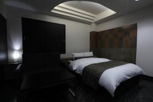 Postel nebo postele na pokoji v ubytování HOTEL C-PLUS - Adult Only