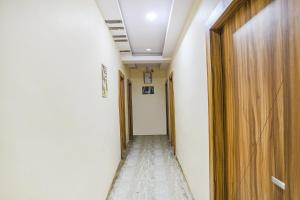 a corridor in a hospital room with a hallway at FabExpress P2 in Bhopal