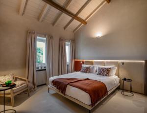 Кровать или кровати в номере Relais Dal Cavaliere