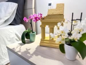 Postel nebo postele na pokoji v ubytování Vicoletto Fiorito
