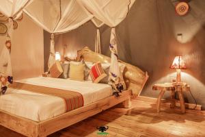 Postelja oz. postelje v sobi nastanitve Embogo Safari Lodges