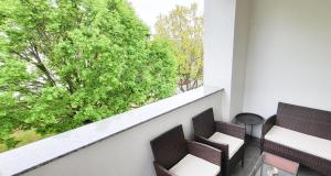 Balkon atau teras di Juhar 1 Apartman