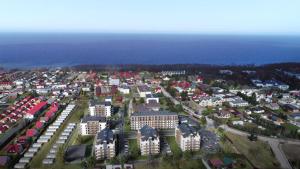 an aerial view of a city with buildings and the ocean at Perła Mórz in Sianozety