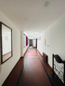 an empty hallway in an office building at HOTEL PLAZA GRAND in Jalandhar
