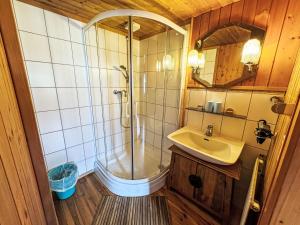 a bathroom with a shower and a sink at Apartment Helmreich-1 by Interhome in Sankt Gallenkirch