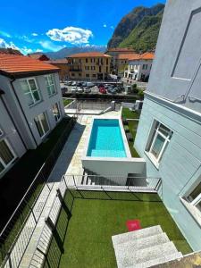 an overhead view of a swimming pool in a building at Apt. Aquarius Oasi di Menaggio in Menaggio