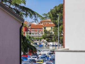a view from a window of a parking lot at Apartment Marina - NVG115 by Interhome in Novigrad Istria