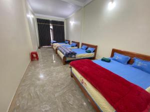 Posteľ alebo postele v izbe v ubytovaní Motel Homestay Tiến Học