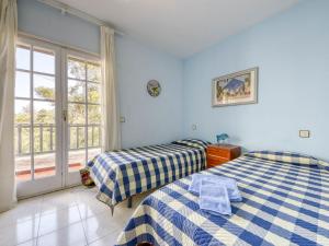 Postel nebo postele na pokoji v ubytování Holiday Home Els Vilars by Interhome