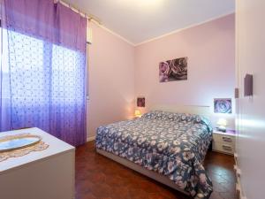 Postel nebo postele na pokoji v ubytování Apartment casa dei fiori by Interhome