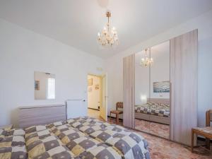 Posteľ alebo postele v izbe v ubytovaní Apartment Compiano by Interhome