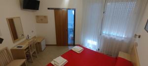 TV o dispositivi per l'intrattenimento presso Hotel K2