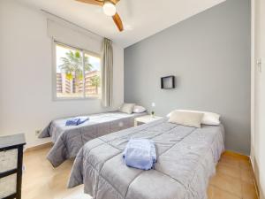 Posteľ alebo postele v izbe v ubytovaní Apartment Mismar-3 by Interhome
