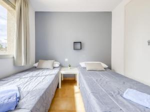 Posteľ alebo postele v izbe v ubytovaní Apartment Mismar-3 by Interhome
