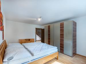 Posteľ alebo postele v izbe v ubytovaní Apartment Schneeberger by Interhome