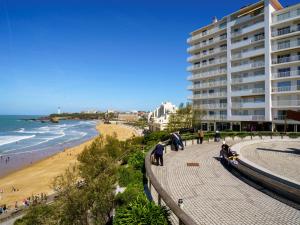 a view of a beach with a large building at Studio Bellevue Clemenceau-2 by Interhome in Biarritz