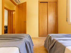 Postel nebo postele na pokoji v ubytování Holiday Home Tatiana by Interhome