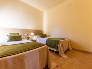 Postel nebo postele na pokoji v ubytování Holiday Home Tatiana by Interhome
