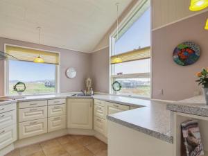 Kitchen o kitchenette sa Holiday Home Lisann - 250m from the sea in NW Jutland by Interhome