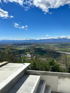 a view of the mountains from the roof of a house at Villa sulle nuvole in San Raffaele Cimena