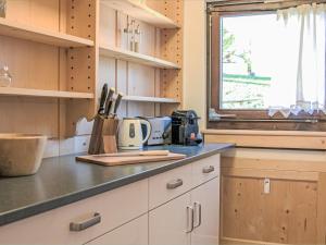 Kuchyň nebo kuchyňský kout v ubytování Apartment Chesa Tschierv II 30 by Interhome