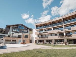 an exterior view of a building at Apartment Lakeside Luxury Apartments by Interhome in Zell am See