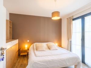 En eller flere senge i et værelse på Villa Cassy by Interhome