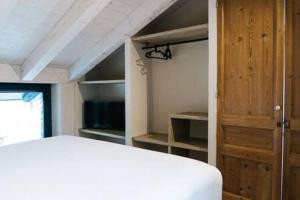 Postel nebo postele na pokoji v ubytování Cal Rus Apartament 3