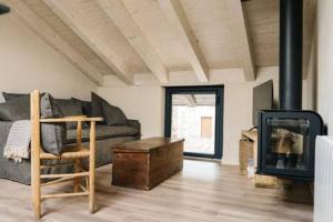 Posezení v ubytování Cal Rus Apartament 3