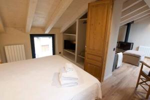Postel nebo postele na pokoji v ubytování Cal Rus Apartament 3