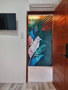 TV a/nebo společenská místnost v ubytování CiNta Hotel