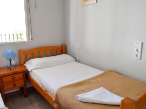 Posteľ alebo postele v izbe v ubytovaní Apartamentos Tierra de Irta 3000 + 37 fotografií