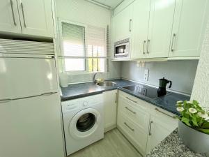 Kuchyňa alebo kuchynka v ubytovaní Apartamentos Tierra de Irta 3000