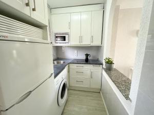 Kuchyňa alebo kuchynka v ubytovaní Apartamentos Tierra de Irta 3000