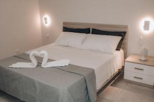 Postel nebo postele na pokoji v ubytování Vicoletto Fiorito