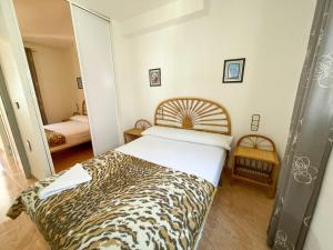 Posteľ alebo postele v izbe v ubytovaní Apartamentos Tierra de Irta 3000