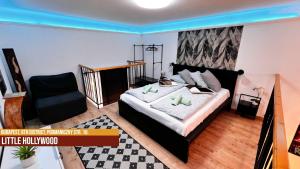 Postel nebo postele na pokoji v ubytování Little Americas Westend Apartments