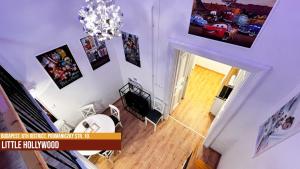 TV a/nebo společenská místnost v ubytování Little Americas Westend Apartments