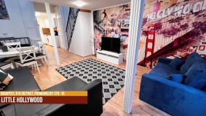 TV a/nebo společenská místnost v ubytování Little Americas Westend Apartments