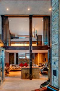 Postel nebo postele na pokoji v ubytování Luxury Loft by Heinz Julen