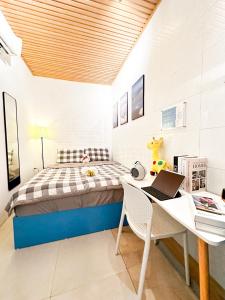 Postel nebo postele na pokoji v ubytování La Casa Di Dicembre Trần Hưng Đạo