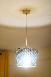 a light that is hanging from a ceiling at Cosy Homes Eldoret in Eldoret