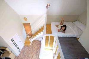 Postel nebo postele na pokoji v ubytování The iNow ไอหนาว เขาค้อ