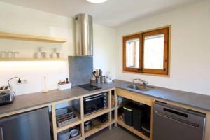 A kitchen or kitchenette at Casa 4 vents