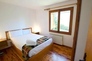A bed or beds in a room at Casa 4 vents