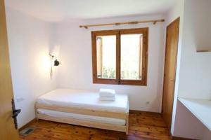 A bed or beds in a room at Casa 4 vents