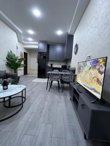 TV a/nebo společenská místnost v ubytování Welcome apartament