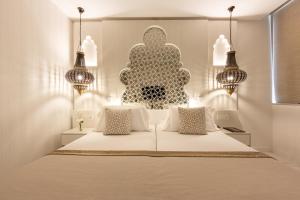 Postel nebo postele na pokoji v ubytování Hotel Saray